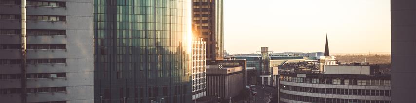 Image of birmingham as the sun is setting showing skyscrapers