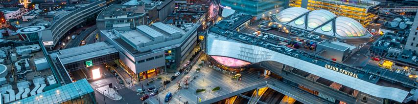 Birmingham city showing grand central in the evening